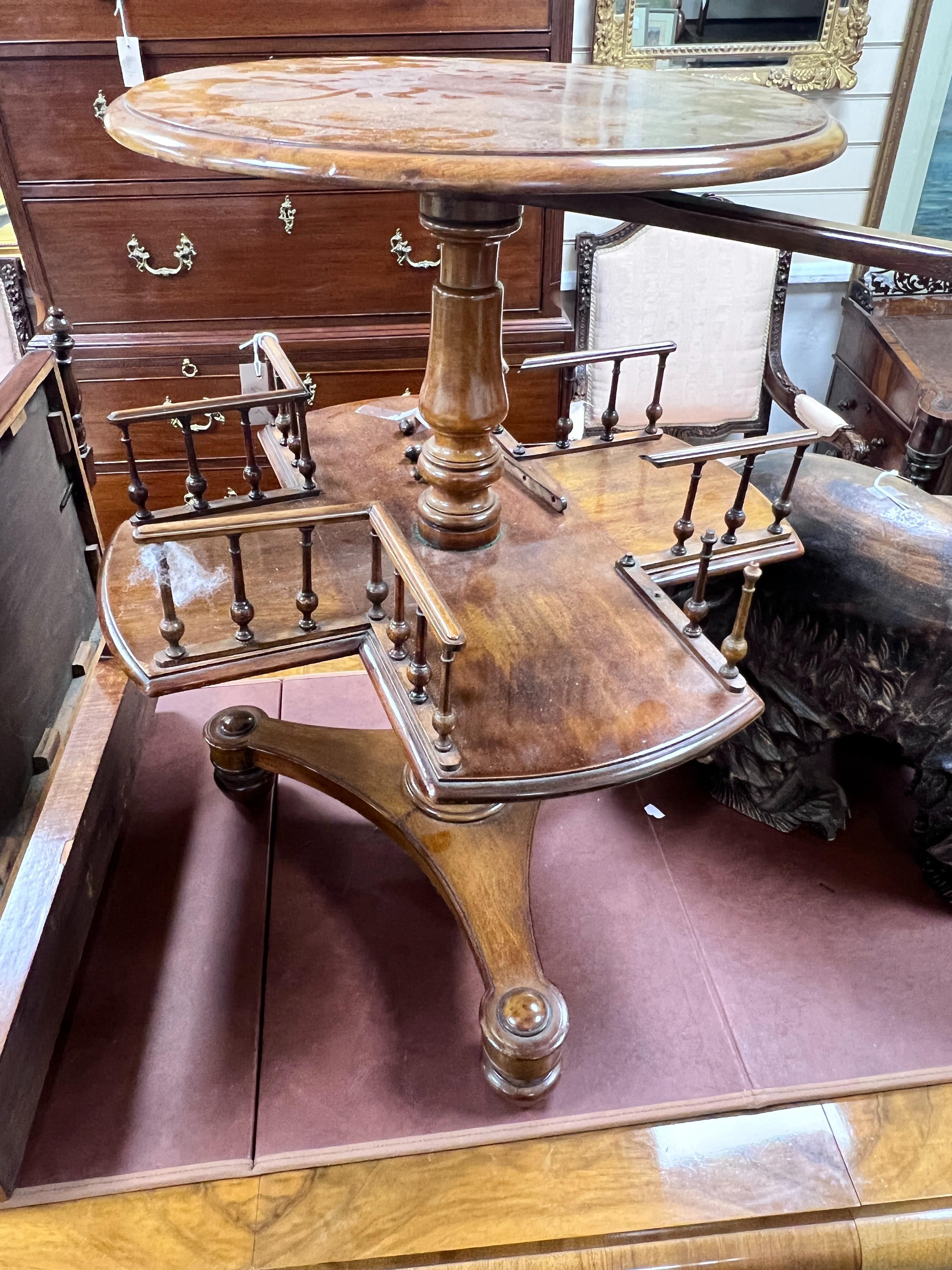 A Victorian circular walnut occasional table in need of restoration, height 70cm